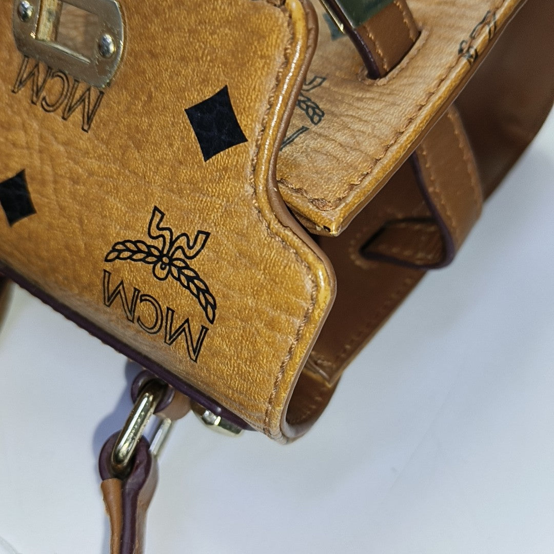 MCM Cognac Coated Canvas Monogrammed Single Shoulder Bag Tote Bag Crossbody Bag Golden hardware shoulder straps-(SKU)-940158793