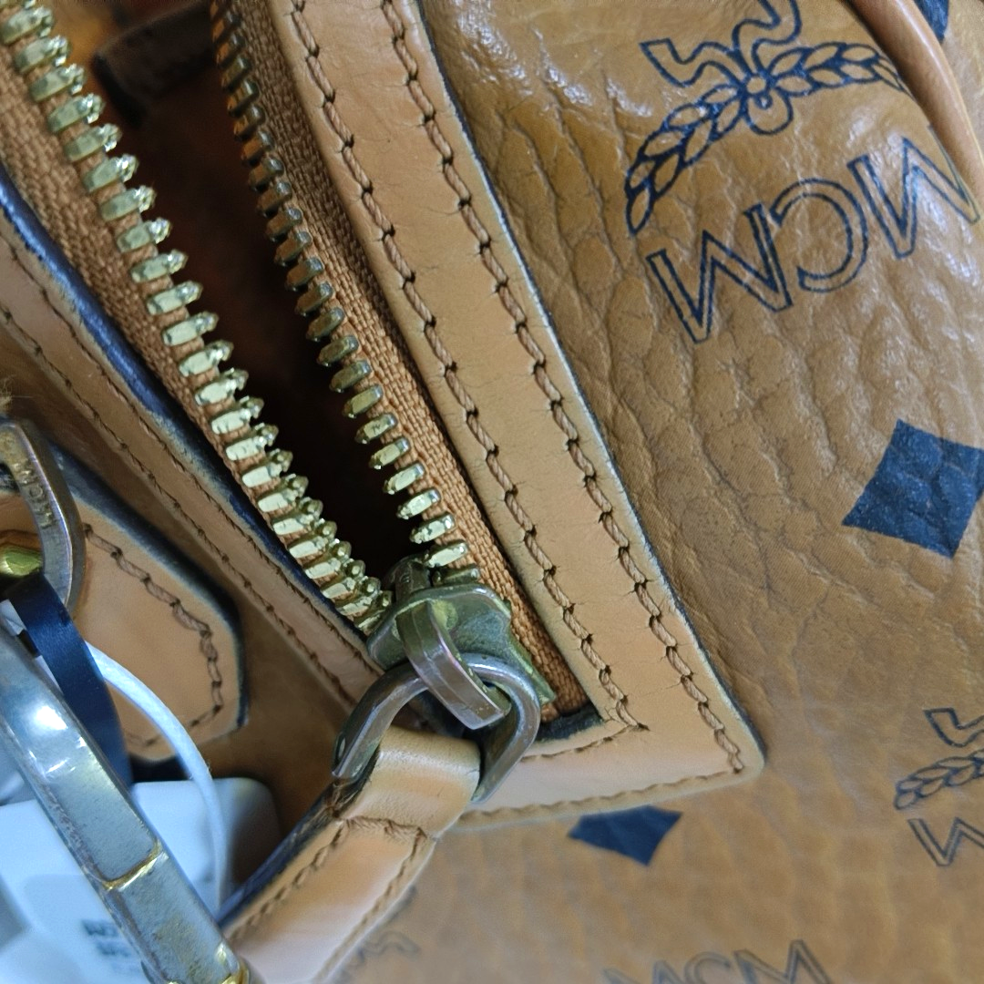 MCM ESSENTIAL Cognac Coated Canvas Monogram Print Boston Bag Single Shoulder Bag Handbag Crossbody Bag Golden hardware Removable shoulder strap-(SKU)-942033097