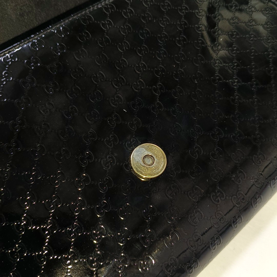 GUCCI Black Calf Leather Monogrammed Relief Handbag Golden hardware-(SKU)-944840173