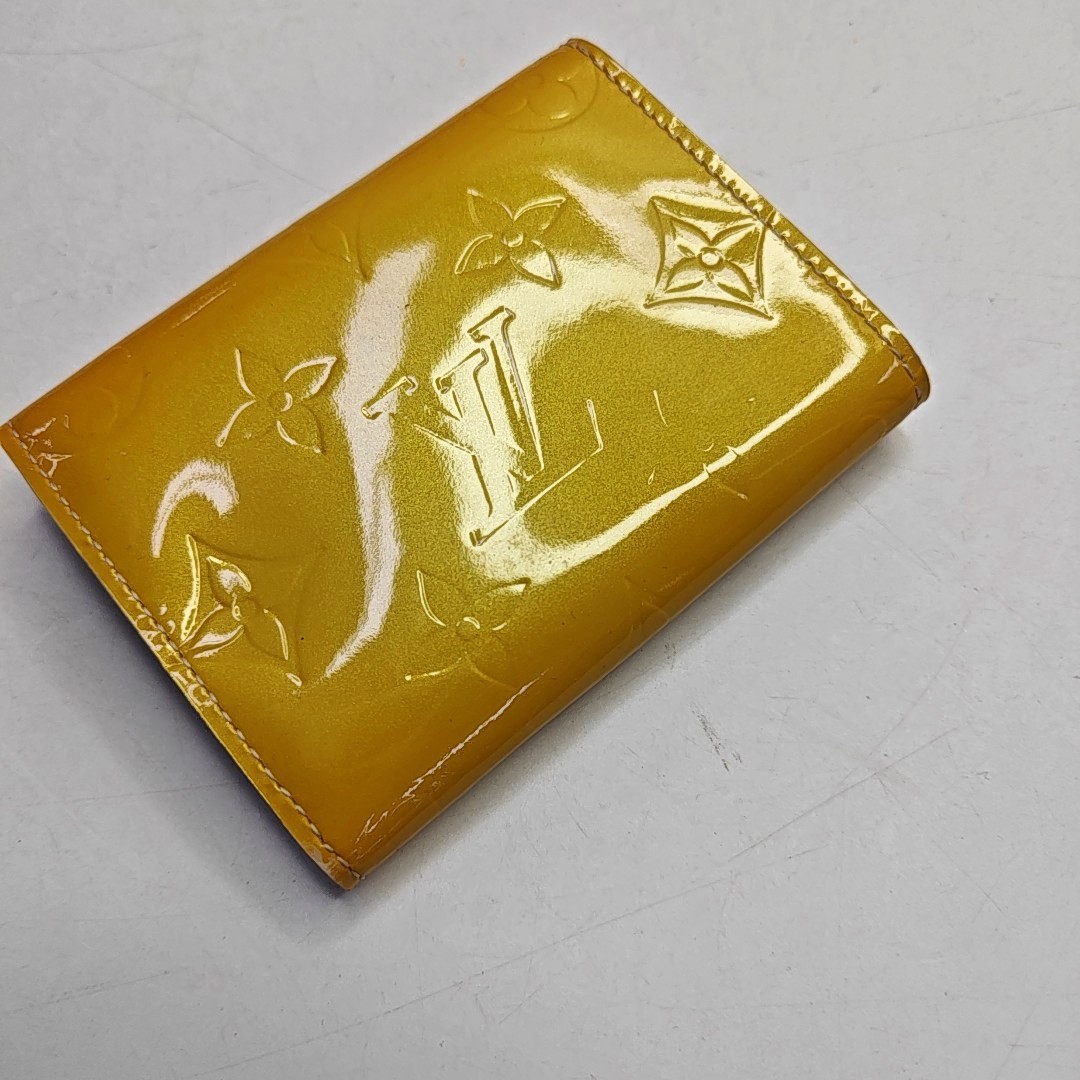 LOUIS VUITTON Yellow Patent Leather Monogrammed Embossed Wallet Golden hardware-(SKU)-958924002