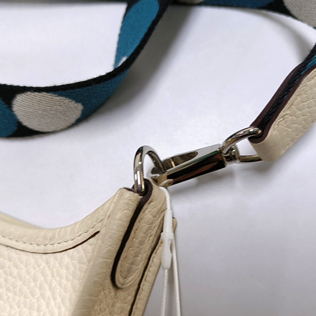 HERMÈS Evelyne Mini Cream Clemence Leather Cutout Evelyne Shoulder Bag Crossbody Bag with Silver Hardware and Z, Detachable Shoulder Strap-(SKU)-947690119