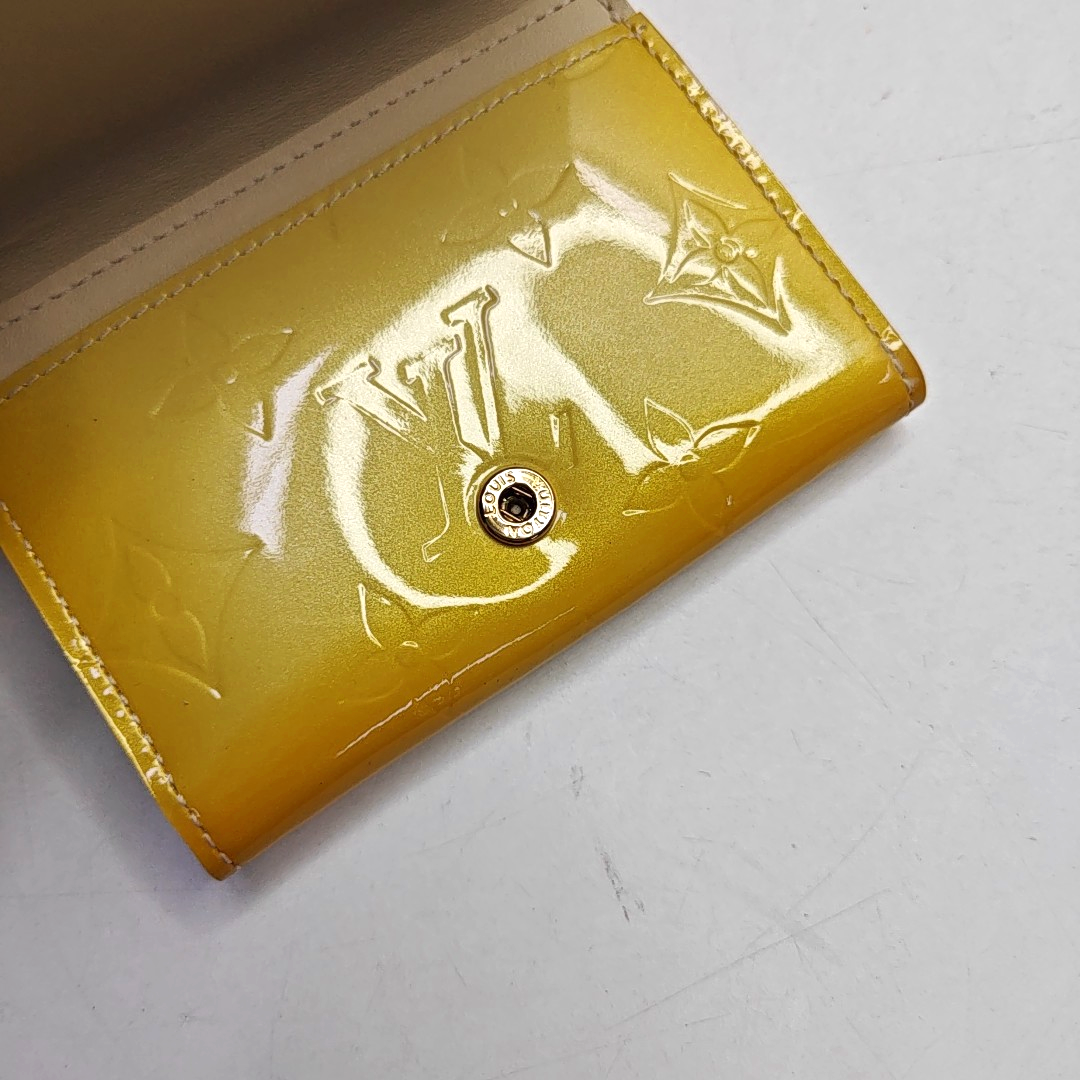LOUIS VUITTON Yellow Patent Leather Monogrammed Embossed Wallet Golden hardware-(SKU)-958924002
