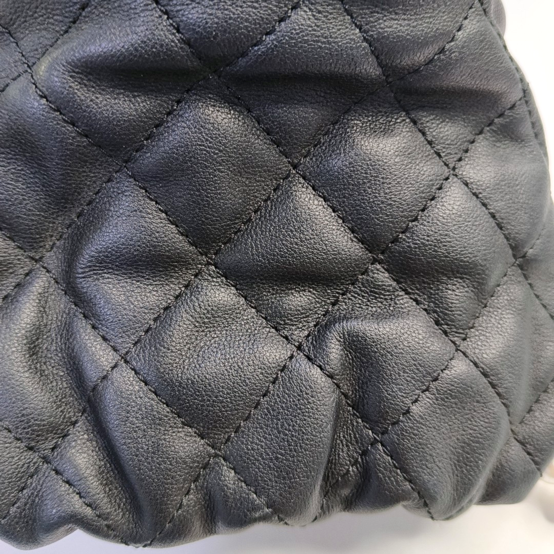 CHANEL DRAWSTRING Mini Black Calfskin Quilted Crossbody Shoulder Bag with Gold Hardware, 31 openings-(SKU)-953109942