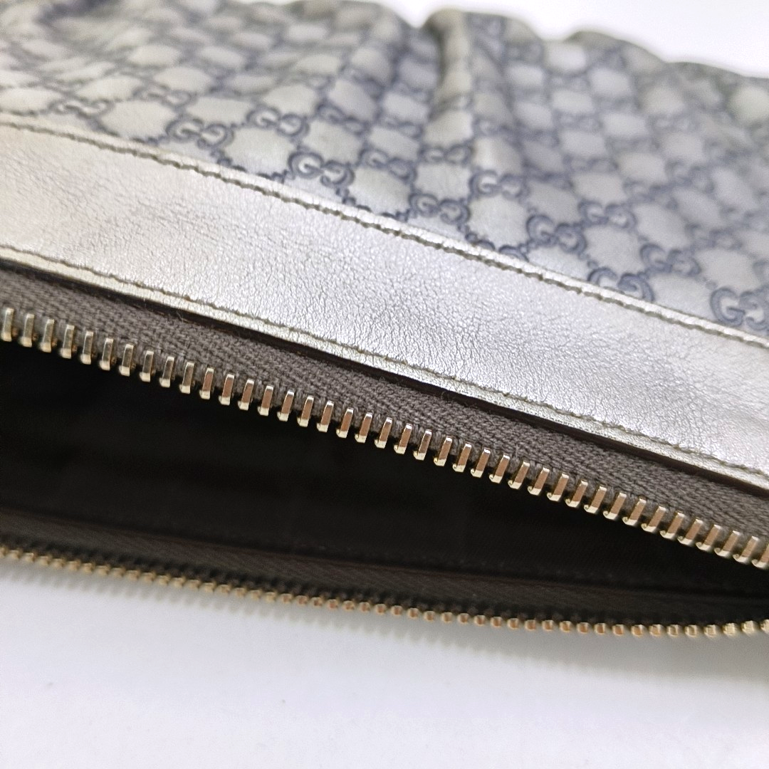 GUCCI Silver Cowhide Monogrammed Embossed Clutch Golden hardware-(SKU)-951850185
