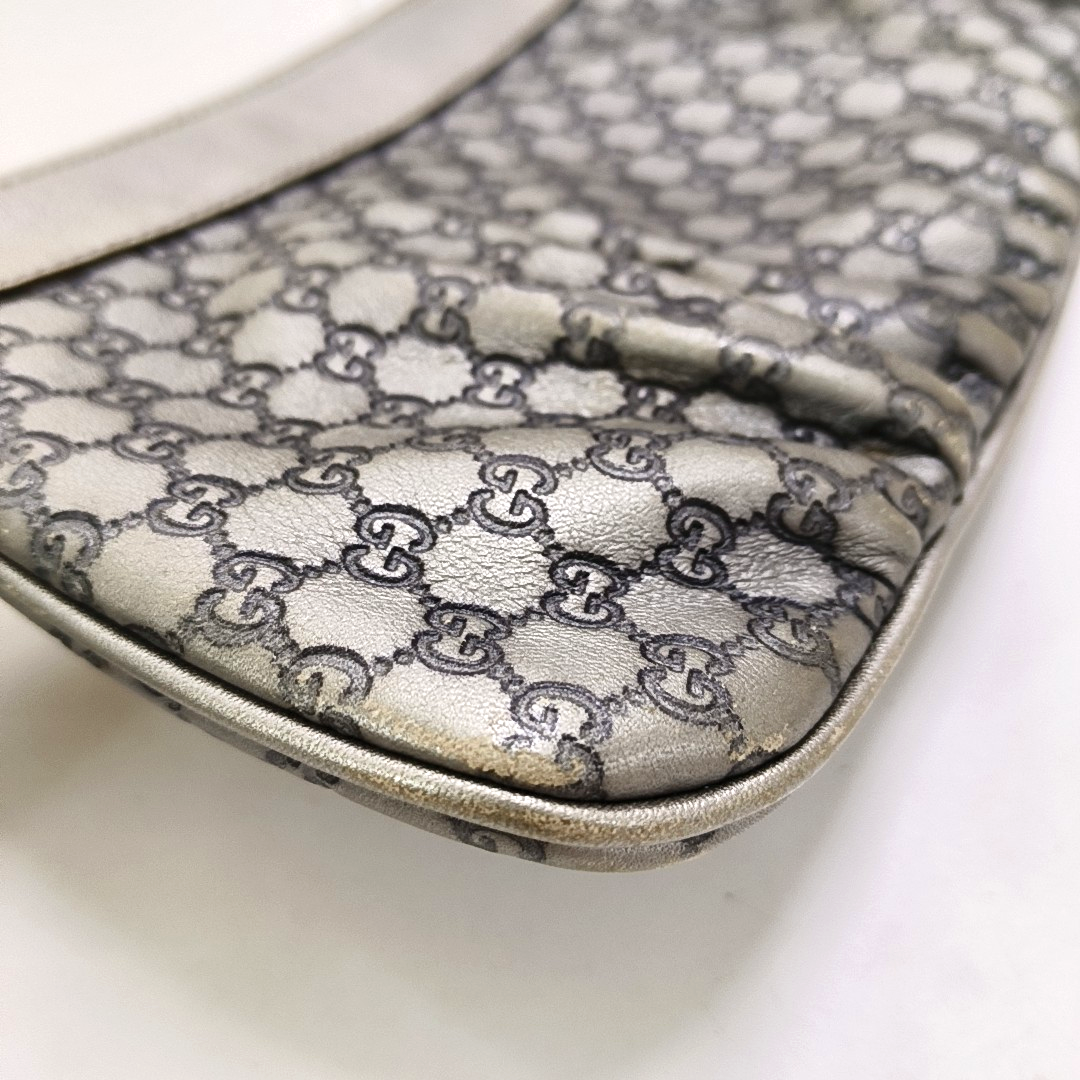 GUCCI Silver Cowhide Monogrammed Embossed Clutch Golden hardware-(SKU)-951850185