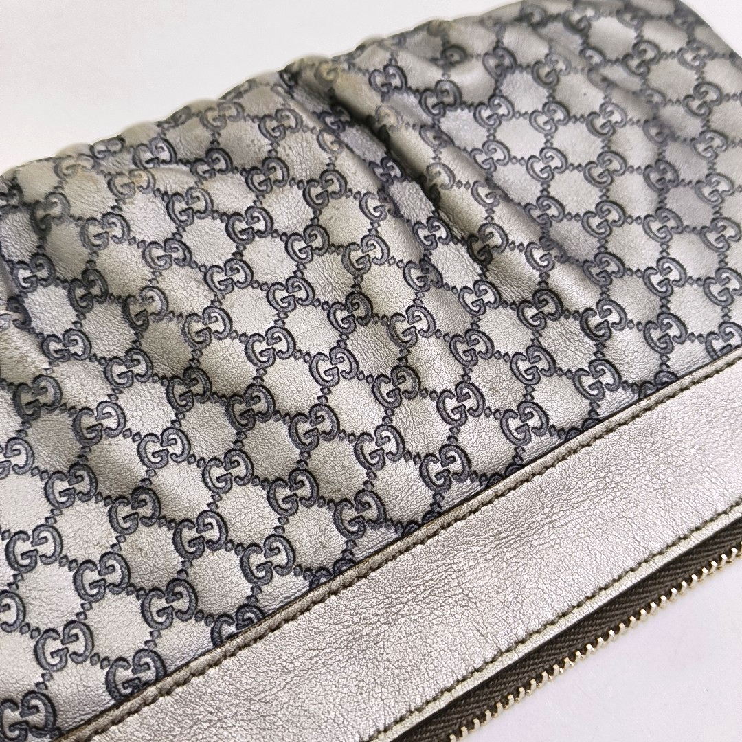 GUCCI Silver Cowhide Monogrammed Embossed Clutch Golden hardware-(SKU)-951850185