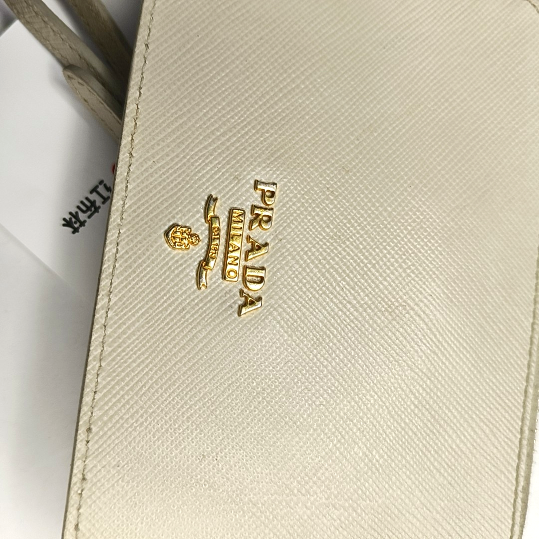 PRADA White Cowhide Stud Embossed Change Purse Golden hardware-(SKU)-953040759