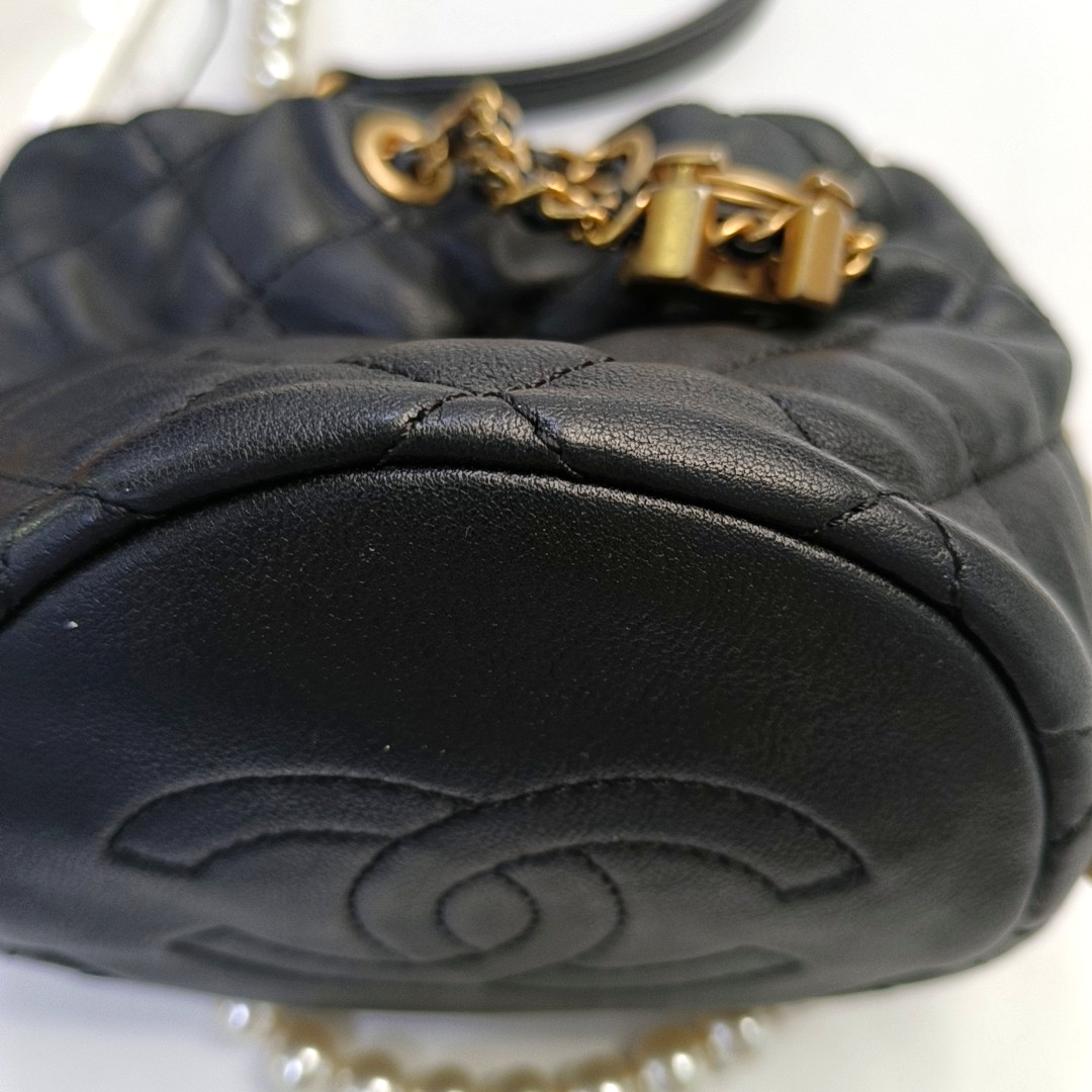 CHANEL DRAWSTRING Mini Black Calfskin Quilted Crossbody Shoulder Bag with Gold Hardware, 31 openings-(SKU)-953109942