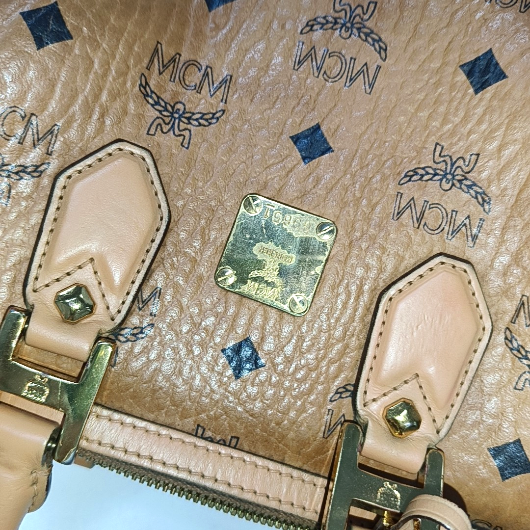 MCM ESSENTIAL Cognac Coated Canvas Monogram Print Boston Bag Single Shoulder Bag Handbag Crossbody Bag Golden hardware Removable shoulder strap-(SKU)-942033097