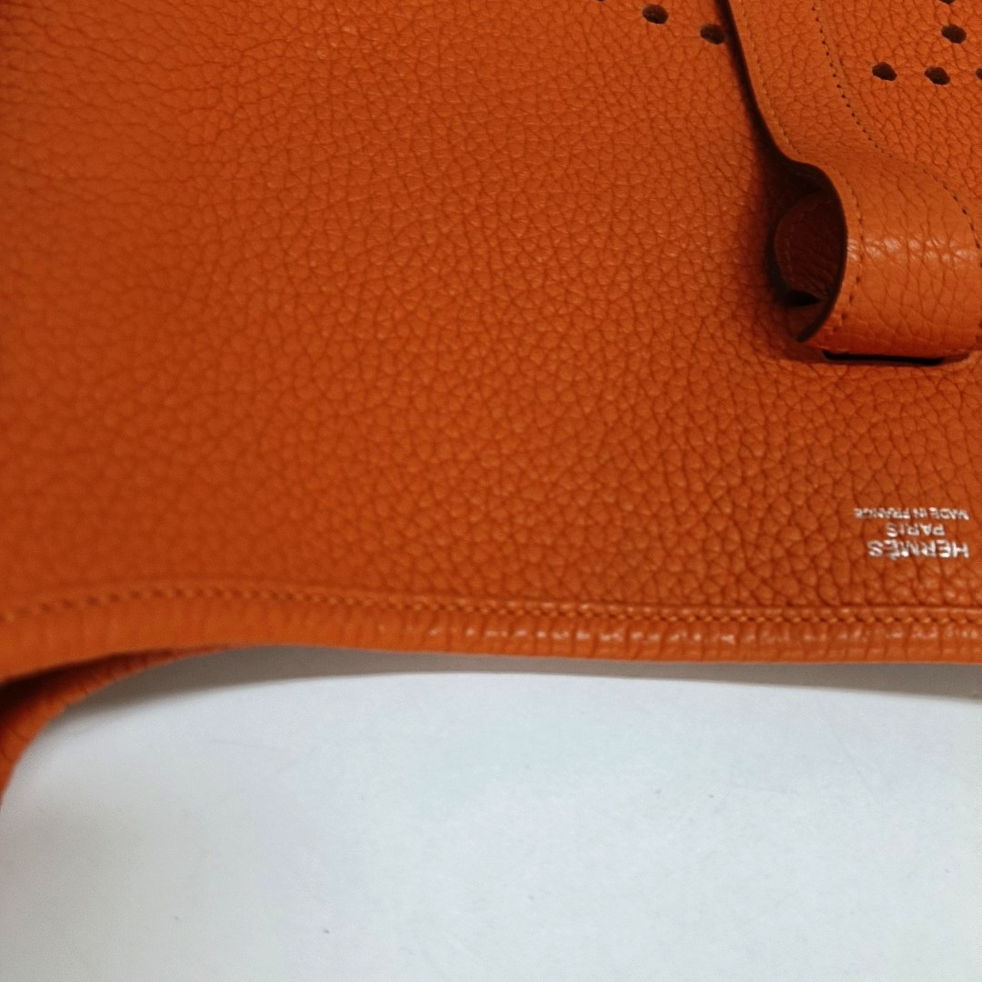 HERMÈS Evelyne GM Hermes orange Clemence leather Evelyne GM bag crossbody bag with handle, silver hardware, embossed H, removable shoulder strap-(SKU)-961912745