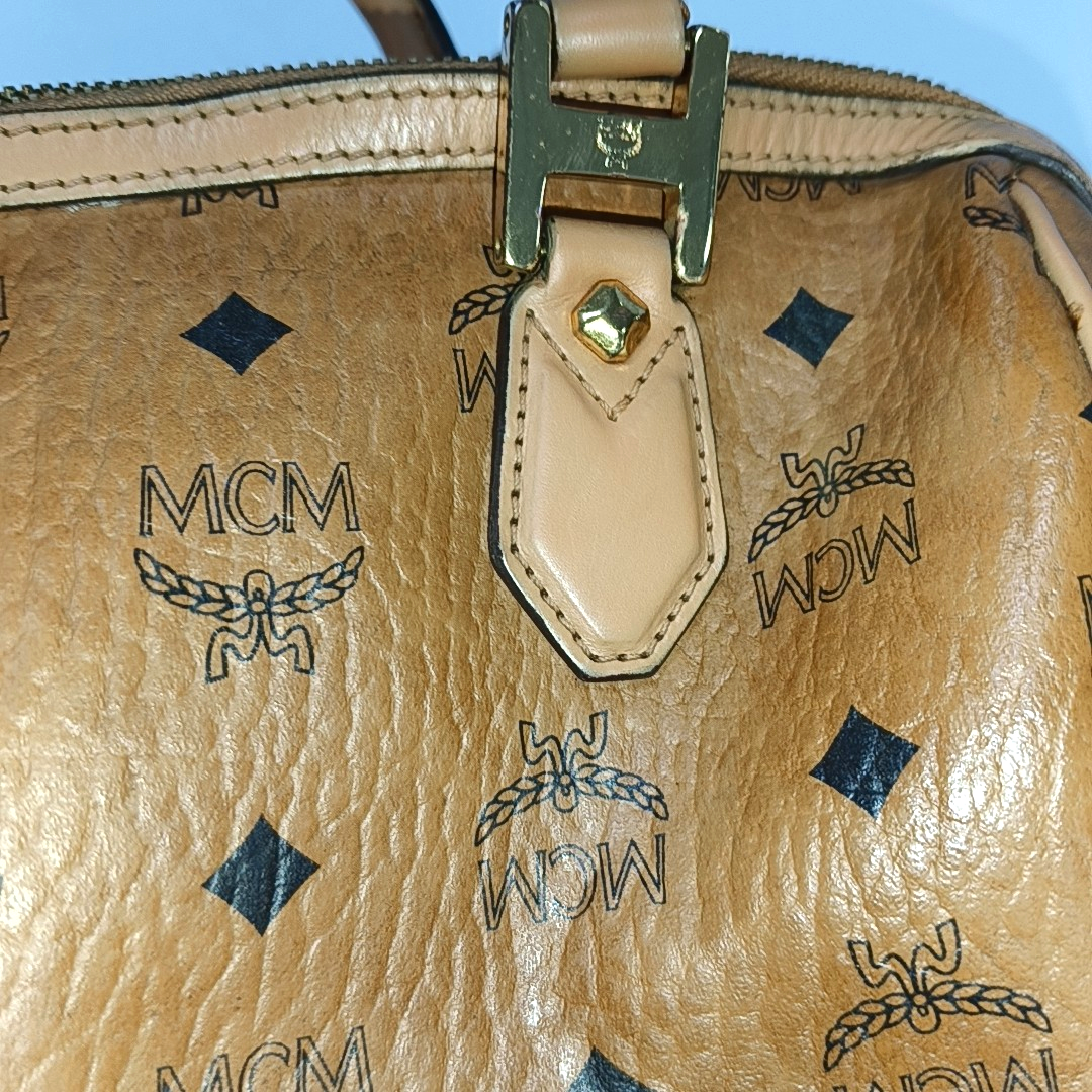 MCM ESSENTIAL Cognac Coated Canvas Monogram Print Boston Bag Single Shoulder Bag Handbag Crossbody Bag Golden hardware Removable shoulder strap-(SKU)-942033097
