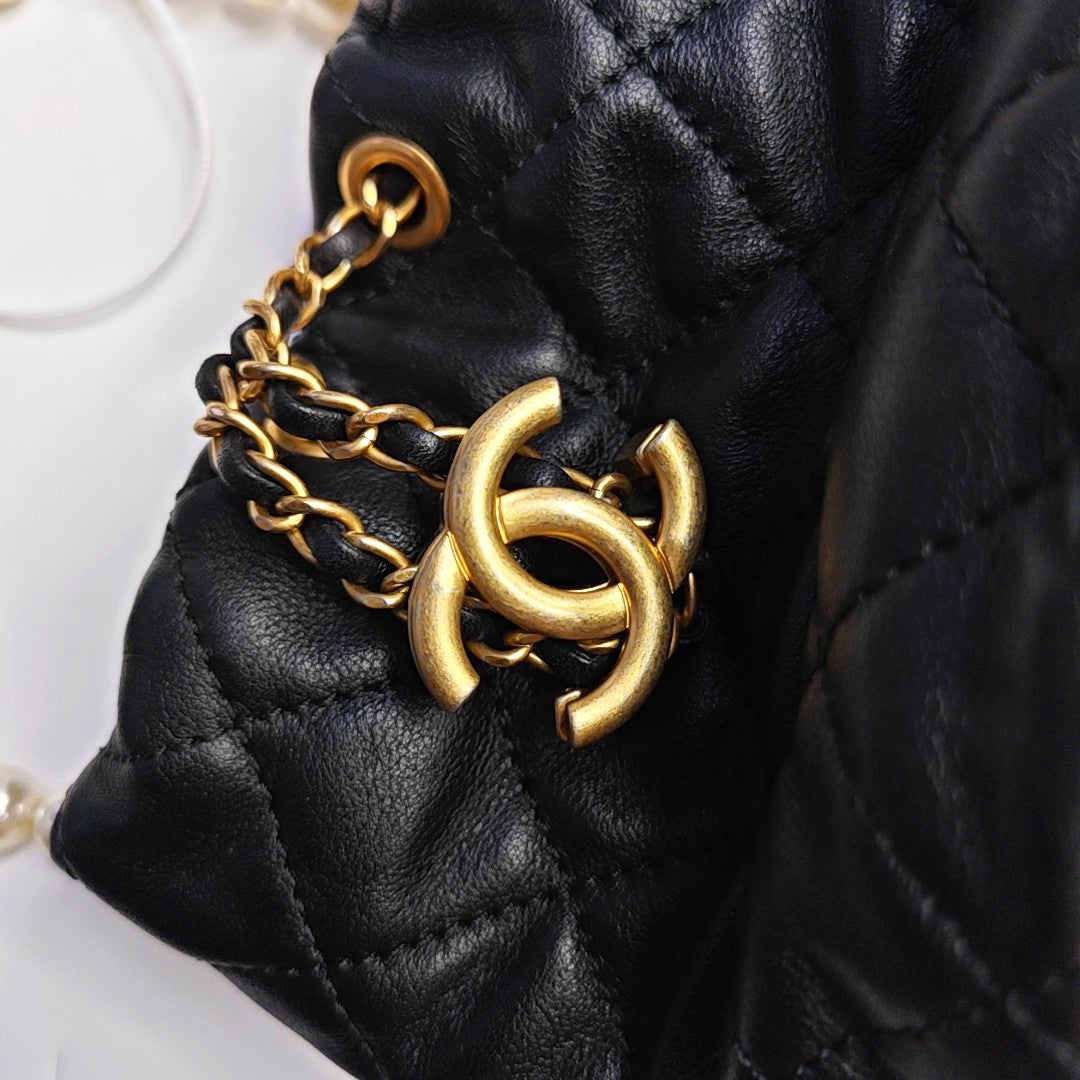 CHANEL DRAWSTRING Mini Black Calfskin Quilted Crossbody Shoulder Bag with Gold Hardware, 31 openings-(SKU)-965301985