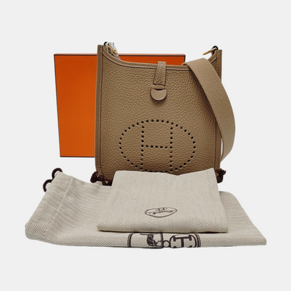HERMÈS Evelyne TPM Malfatti Beige Clemence Leather Cutout Evelyne Shoulder Bag Crossbody Bag Golden Hardware U Engraved Removable Shoulder Strap-(SKU)-969331994