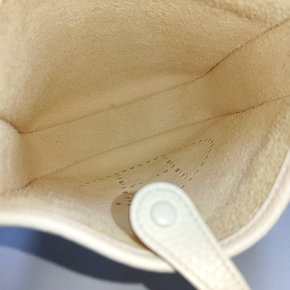 HERMÈS Evelyne Mini Cream Clemence Leather Cutout Evelyne Shoulder Bag Crossbody Bag with Silver Hardware and Z, Detachable Shoulder Strap-(SKU)-947690119