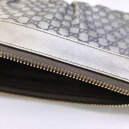GUCCI Silver Cowhide Monogrammed Embossed Clutch Golden hardware-(SKU)-951850185