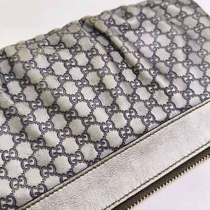 GUCCI Silver Cowhide Monogrammed Embossed Clutch Golden hardware-(SKU)-951850185